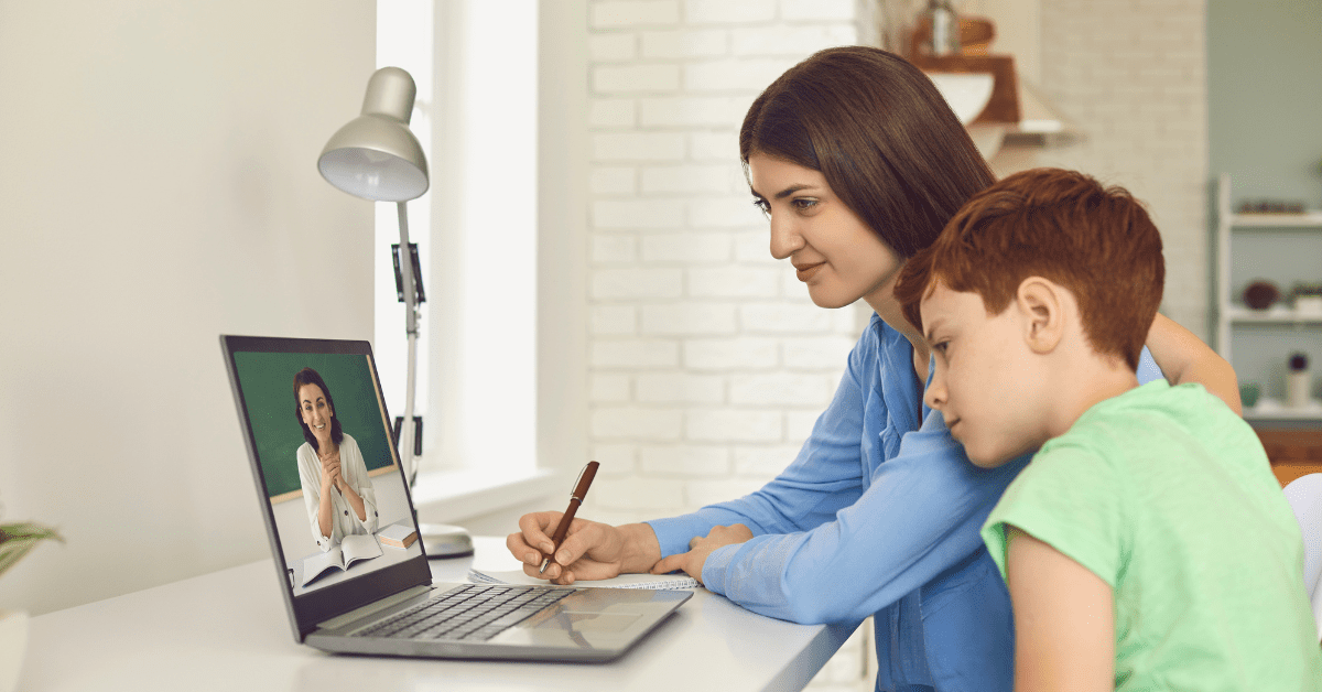 Mother monitoring son's online classes